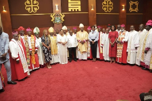 Image of Ghanaian clergy with the president of the Republic of Ghana