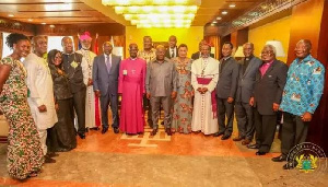 Image of Member of the Board of Trustees of the National Cathedral with President Akufo-Addo and his vice