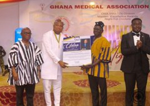 Image of Samuel Okudzeto Ablakwa receiving the award from the GMA