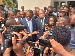 Image of Samuel Okudzeto Ablakwa mobbed by some top NDC officials after the court sitting