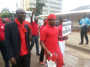 Image of Divine Nkrumah (middle) demostrating against Mahama in 2014