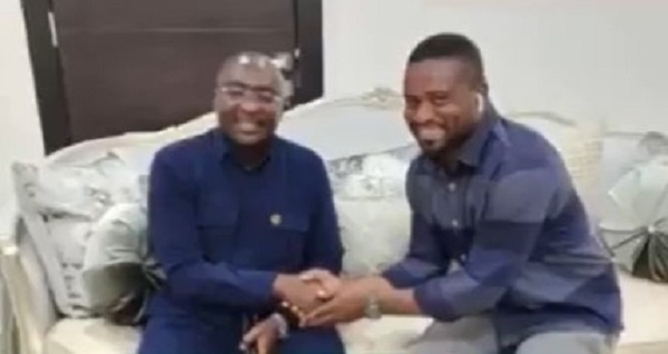 Image of One of the perons who allegedly booed Mahama (right) with Bawumia