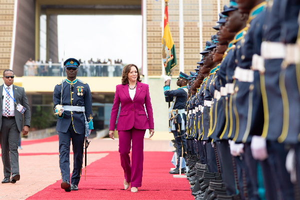 Image of Kamala Harris inspects guard of honour at Jubilee House